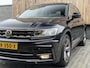 Volkswagen Tiguan 1.4 TSI R-line Handgeschakeld | Half/leer | R-line stuurwiel | LED verlichting | Stoelverwarming | Zwarte hemelbekleding | Apple CarPlay | Adaptieve cruise control | Parkeersensoren voor en achter