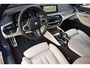 BMW 5-Serie 520i High Executive * ComfortStoelen * Harman/Kardon * M-Sportpakket * Schuifdak * Trekhaak *