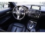 BMW 1-Serie 118i High Executive M Sport Autom Schkdak Leder Sportst Stoelverw Navi Clima 2x PDC LED Kopl LMV Trekh ENZ NL Auto.