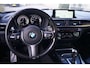 BMW 1-Serie 118i High Executive M Sport Autom Schkdak Leder Sportst Stoelverw Navi Clima 2x PDC LED Kopl LMV Trekh ENZ NL Auto.