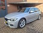 BMW 3-Serie Touring 318i M Sport Edition Panoramadak / Apple Carplay / Trekhaak / Led Verlichting / Achteruitrijcamera /