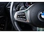 BMW 1-Serie M135i xDrive High Executive Edition Panoramadak - Head up - Harman Kardon - Active Cruise Control - Driving/Parking Assistant - Elektrisch verstelbare/verwarmde stoelen - Getinte Ruiten -