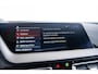 BMW 1-Serie M135i xDrive High Executive Edition Panoramadak - Head up - Harman Kardon - Active Cruise Control - Driving/Parking Assistant - Elektrisch verstelbare/verwarmde stoelen - Getinte Ruiten -