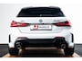 BMW 1-Serie M135i xDrive High Executive Edition Panoramadak - Head up - Harman Kardon - Active Cruise Control - Driving/Parking Assistant - Elektrisch verstelbare/verwarmde stoelen - Getinte Ruiten -