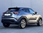 Nissan Juke 1.0 DIG-T N-Connecta Automaat / Fabrieksgarantie tot 03-2028 / 1.250 kg trekgewicht / Navigatie / Cold Pack / Stuur- en stoelverwarming / Apple Carplay Android / 17" LM wielen /