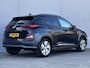 Hyundai Kona Electric EV Premium 64 kWh Automaat / Accu SoH 100% / HUD / Navigatie / Adaptieve CC / Elektr. stoelen / Stoelventilatie / Stuur-, stoel- en achterbankverwaming / Apple Carplay Android /