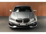 BMW 1-Serie 118i Sport-line Aut. Leer Navi ACC Camera PDC Climate Zwarte hemelbekleding LM velgen BTW auto