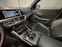 BMW 3-Serie Touring 330e High Executive M Sport 18"/Panoramadak/Laser LED/Harman Kardon/Keyless/Head-up/360 camera/Dodehoek/Adaptieve cruise/Stoel + stuurverwarming/Adaptief M onderstel