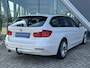 BMW 3-Serie Touring 320i High Executive 184pk Trekhaak / Panoramadak / Stoelverwarming