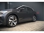 Volkswagen ID.4 First 77 kWh | Stoelverwarming | Stuurverwarming | Trekhaak | Warmtepomp | Adaptive Cruise Control | Navigatie | Apple Carplay | Keyless | Camera | Parkersensoren |