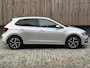 Volkswagen Polo 1.0 TSI R-line | Half leer | Sportstoelen | Airconditioning | Adaptieve cruise control | Trekhaak | Getint glas | Apple CarPlay | Zwarte hemelbekleding | Cameleon voorraam