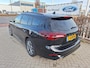 Ford Focus Wagon 1.0 EcoBoost Hybrid ST Line | 155PK! | Draadloos Apple Carplay/Android Auto | Adaptive Cruise | Winter Pakket | Navi | Dodehoekdetectie | 17" LMV |