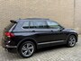 Volkswagen Tiguan 1.4 TSI eHybrid 245pk PHEV R-Line Business+ | Panoramadak | Adaptieve cruise | Lane assist | Headup display | Matrix LED | DAB | Apple CarPlay | Camera | Stoel&stuurverwarming | Navigatie | Virtual cockpit | IO.light | Elektrische achterklep | Dodehoekdetectie | Volledig onderhouden