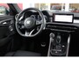Alfa Romeo Tonale 1.5T 160PK Hybrid VELOCE | PANORAMISCH SCHUIF/KANTEL DAK | PREMIUM PACK: LEDEREN BEKLEDING/GEVENTILEERDE VOORSTOELEN/4-VOUDIG ELEKTRISCH VERSTELBARE LENDESTEUN VOORSTOELEN/HOOGGLANS ZWARTE RAAMOMLIJSTING/AMBIENT LIGHTING | TECHNOLOGY PACK: PARKEERWAARSCHUWING VOOR EN ACHTER/360° CAMERA/AUTOMATISCH INPARKEREN/ AUTONOMOUS DRIVING LEVEL 2: ADAPTIVE CRUISE CONTROL/LANE CENTERING ASSIST/TRAFFIC JAM ASSIST DODEHOEK DETECTIE AUTOMATISCH DIMMENDE BUITENSPIEGELS ELEKTRISCH BEDIENBARE ACHTERKLEP | WINTERPACK: STOELVERWARMING VOOR/STUURVERWARMING/VERWARMBARE RUITENSPROEIERS | HARMAN KARDON SOUND SYSTEM | 20" LICHTMETALEN VELGEN "GRAPHITE GREY" | DRAADLOZE TELEFOONLADER | NAVIGATIE | DRAADLOZE APPLE CARPLAY/ANDROID AUTO | FULL LED MATRIX KOPLAMPEN |