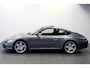 Porsche 911 3.8 Carrera S 261kW/355pk Tiptronic YOUNGTIMER! SPORT CHRONO + OPEN DAK + CRUISE + CD-WISSELAAR + PORSCHE PCM NAVIGATIE + BOSE + LEER + SPORTUITLAAT MET KLEP + BI-XENON VERLICHTING + STOELVERWARMING + PARKSENSOREN V&A + 19" LM-VELGEN!!