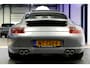 Porsche 911 3.8 Carrera S 261kW/355pk Tiptronic YOUNGTIMER! SPORT CHRONO + OPEN DAK + CRUISE + CD-WISSELAAR + PORSCHE PCM NAVIGATIE + BOSE + LEER + SPORTUITLAAT MET KLEP + BI-XENON VERLICHTING + STOELVERWARMING + PARKSENSOREN V&A + 19" LM-VELGEN!!