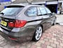 BMW 3-Serie Touring 328i High Executive key-less/head-up display/glazen panorama-dak