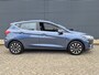 Ford Fiesta 1.0 EcoBoost Hybrid Titanium | Parkeersensoren | Keyless Entry | Stoel en Stuurverwarming | Voorruitverwarming | Navigatie via Apple Carplay of Android Auto |