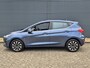 Ford Fiesta 1.0 EcoBoost Hybrid Titanium | Parkeersensoren | Keyless Entry | Stoel en Stuurverwarming | Voorruitverwarming | Navigatie via Apple Carplay of Android Auto |