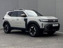 Dacia Duster 1.6 Hybrid 140 Extreme Automaat / Fabrieksgarantie tot 05-2028  / Stuur- en stoelverwarming / Voorruitverwarming / Navigatie via Apple Carplay Android / 17"  LM wielen /