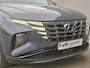 Hyundai Tucson 1.6 T-GDI HEV Premium Sky Automaat / Fabrieksgarantie tot 03-2029 / Dealer onderhouden / Adaptief cruise control / Glazen schuif- en kanteldak / Elektrische achterklep / Stuur-, Stoel en Achterbank verwarming / Rondomzicht camera / Adaptief CC /