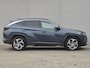 Hyundai Tucson 1.6 T-GDI HEV Premium Sky Automaat / Fabrieksgarantie tot 03-2029 / Dealer onderhouden / Adaptief cruise control / Glazen schuif- en kanteldak / Elektrische achterklep / Stuur-, Stoel en Achterbank verwarming / Rondomzicht camera / Adaptief CC /