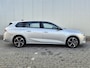 Opel Astra Sports Tourer 1.6 TURBO 180PK HYBRID | AUTOMAAT | Parkeersensoren rondom | Adaptieve cruise control | 17 inch LMV | Zwarte spiegelkappen | Airco | Achterbank in delen neerklapbaar | Airco | Airco (automatisch)