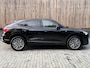 Audi Q3 35 TFSI S edition Automaat | Zwart optiek | Navigatiesysteem | Half-leer | Getint glas | Cruise & climate control | Lane assist | 19 inch velgen | LED verlichting | Elektrisch bedienbare achterklep | Parkeersensoren achter