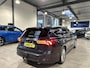 Ford Focus Wagon EcoBoost 125pk Titanium | Trekhaak | 100% dealer onderhouden | Full Led | B&O | Winterpack |