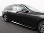 Mercedes-Benz C-klasse Estate 200 AMG Line | Climate control | Achteruitrijcamera | Wegklapbare trekhaak | Navigatie | Dodehoek assistent | LED | Sfeerverlichting | Adaptieve cruise control | Verwarmde voorstoelen | Elektrische kofferbak