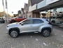 Toyota Yaris Cross 1.5 Hybrid 130pk Dynamic Comfort dodehoekdetectie / stoelverwarming / stuurwielverwarming / parkeersensoren voor + achter / Navigatie / Apple Carplay / Android Auto / parkeercamera / 10 jaar garantie / rijklaarprijs