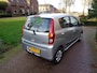 Daihatsu Cuore 1.0 51KW 5D Premium Airco bij Daihatsu dealer met 12 maanden Bovag garantie.