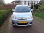 Daihatsu Cuore 1.0 51KW 5D Premium Airco bij Daihatsu dealer met 12 maanden Bovag garantie.