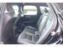Volvo XC60 T6 Recharge AWD R-Design | Panoramadak | Stoelverwarming | Parkeercamera | BLIS | Pilot Assist | 21 Inch | Glossy Black | Keyless
