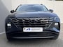 Hyundai Tucson 1.6 T-GDI HEV 230pk Comfort Smart / Fabrieksgarantie tot 09-2028 ** / Dealer onderhouden / Trekgewicht 1650 KG / Navigatie / Achteruitrijcamera / Stuur- en stoelverwarming / Apple Carplay/Android auto / 19" LM /