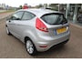 Ford Fiesta 1.25 Ghia , 82pk , Climate control , Cruise control , Voorruitverwarming ,Bluetooth LM velgen , Parkeersensoren achter , Inklapbare buiten spiegel