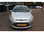 Ford Fiesta 1.25 Ghia , 82pk , Climate control , Cruise control , Voorruitverwarming ,Bluetooth LM velgen , Parkeersensoren achter , Inklapbare buiten spiegel