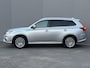 Mitsubishi Outlander 2.4 PHEV Instyle / Trekhaak (Trekgewicht 1.500kg) / Elektrisch Glazen Schuif- en Kanteldak / Navigatie via Apple Carplay & Android Auto / Stuur- en Stoelverwarming / Rondomzicht camera / Keyless Entry & Start / Adaptieve Cruise Control / Climate Control / Elektrische Achterklep