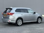 Mitsubishi Outlander 2.4 PHEV Instyle / Trekhaak (Trekgewicht 1.500kg) / Elektrisch Glazen Schuif- en Kanteldak / Navigatie via Apple Carplay & Android Auto / Stuur- en Stoelverwarming / Rondomzicht camera / Keyless Entry & Start / Adaptieve Cruise Control / Climate Control / Elektrische Achterklep