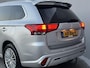 Mitsubishi Outlander 2.4 PHEV Instyle / Trekhaak (Trekgewicht 1.500kg) / Elektrisch Glazen Schuif- en Kanteldak / Navigatie via Apple Carplay & Android Auto / Stuur- en Stoelverwarming / Rondomzicht camera / Keyless Entry & Start / Adaptieve Cruise Control / Climate Control / Elektrische Achterklep