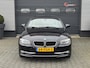 BMW 3-Serie Cabrio 320i High Executive | Navigatie | Stoelverwarming | Lederen Bekleding | Lichtmetalen Velgen | Xenon |