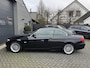 BMW 3-Serie Cabrio 320i High Executive | Navigatie | Stoelverwarming | Lederen Bekleding | Lichtmetalen Velgen | Xenon |