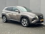 Hyundai Tucson 1.6 T-GDI PHEV Comfort Smart 4WD / Vaste Trekhaak 13-polig (Trekgewicht 1.350kg) / Achteruitrijcamera / Stuur- en Stoelverwarming / Climate Control /  Adaptieve Cruise Control / Apple Carplay & Android Auto / Keyless Entry & Start / Navigatie full map / Elektrische Achterklep