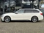 BMW 3-Serie Touring 335i xDrive High Executive Pano/Trekhaak/HUD/Clima/Navi/Cruise