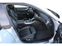 BMW i4 M50 High Executive 84 kWh | Incl. 12 maanden garantie | Assisted driving | Stoel/stuurverwarming | Stoelventilatie | Uitklapbare trekhaak | Head-up display | Memory seat | Schuif/kantel dak | Harman/Kardon | 360° camera |