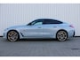 BMW i4 M50 High Executive 84 kWh | Incl. 12 maanden garantie | Assisted driving | Stoel/stuurverwarming | Stoelventilatie | Uitklapbare trekhaak | Head-up display | Memory seat | Schuif/kantel dak | Harman/Kardon | 360° camera |