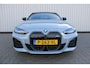 BMW i4 M50 High Executive 84 kWh | Incl. 12 maanden garantie | Assisted driving | Stoel/stuurverwarming | Stoelventilatie | Uitklapbare trekhaak | Head-up display | Memory seat | Schuif/kantel dak | Harman/Kardon | 360° camera |