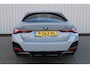 BMW i4 M50 High Executive 84 kWh | Incl. 12 maanden garantie | Assisted driving | Stoel/stuurverwarming | Stoelventilatie | Uitklapbare trekhaak | Head-up display | Memory seat | Schuif/kantel dak | Harman/Kardon | 360° camera |