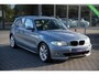 BMW 1-Serie 118i High Executive|Org NL NAP|Automaat|M-Sport|Xenon|Trekhaak|Airco|Cruise|Volledig Onderhouden