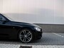 BMW 3-Serie Touring 320i M-sport edition Shadow line | Adaptive cruise | Navi | PDC | Climate control | Dodehoek | Leder | Dealer onderhouden